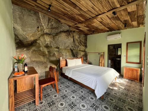 En eller flere senge i et værelse på Tam Coc Golden Fields