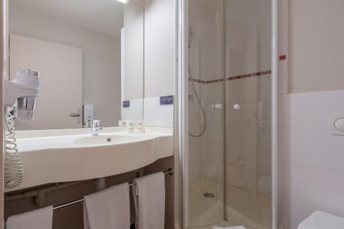 Et badeværelse på Ace Hotel Issoire