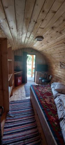 Postel nebo postele na pokoji v ubytování Pensiunea Micul Maramureș