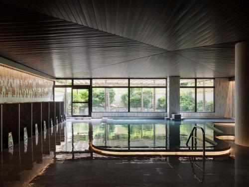 Bazén v ubytování Grand Mercure Minamiboso Resort & Spa nebo v jeho okolí