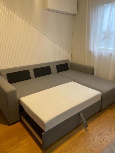 Een bed of bedden in een kamer bij Luna Apartments Estonia