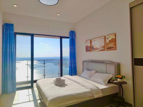 Postel nebo postele na pokoji v ubytování Danga Bay Beach-Side Family Getaway