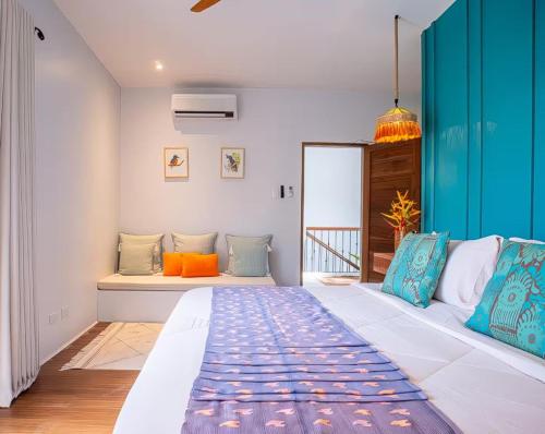 En eller flere senge i et værelse på Tropical Elegance in central Panglao !