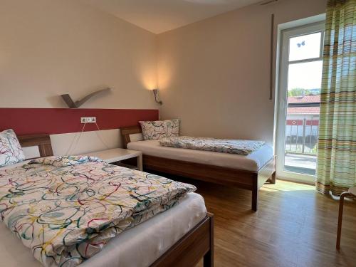 Giường trong phòng chung tại Haflinger Hof Detig