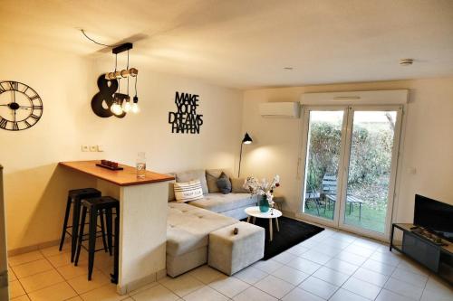 Le Cocoon Jasmin T2 RDC cosy avec jardin clos
