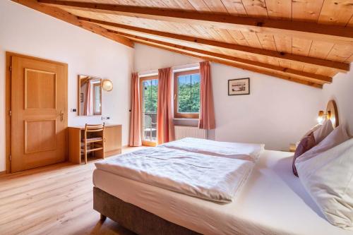 Postel nebo postele na pokoji v ubytování New Residence Schnatzhof Schlanders