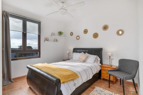 En eller flere senge i et værelse på Casa Lunnett