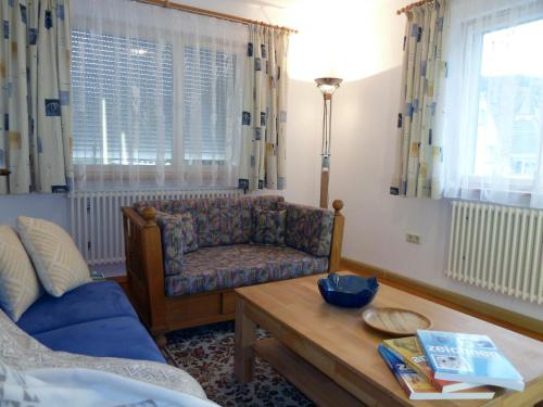 Khu vực ghế ngồi tại Ferienwohnung am Wald Dörlinbach