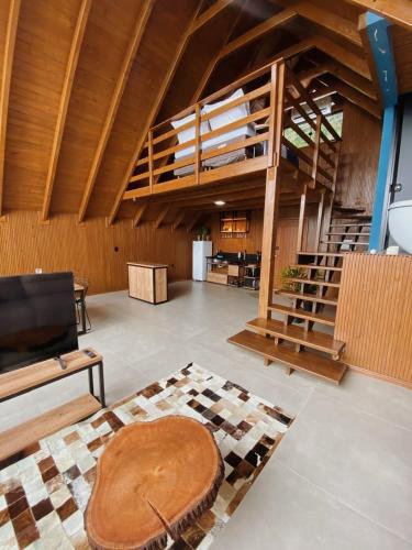 Et opholdsområde på Refúgio na Rocha - Chalé