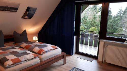 Postel nebo postele na pokoji v ubytování Ferienwohnung Jansen