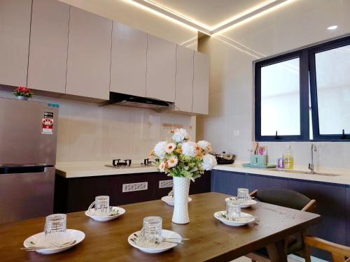 Køkken eller tekøkken på Deluxe 3 Bedroom Garden View