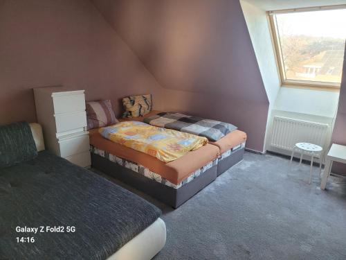 Giường trong phòng chung tại Ubytovna Kadaň