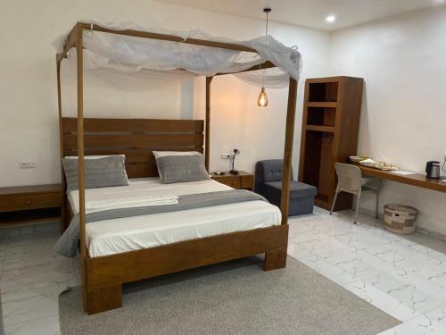 En eller flere senge i et værelse på Hotel FIrdou