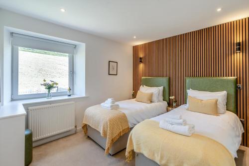 Giường trong phòng chung tại 2 Bed in Newburgh oc-f32595