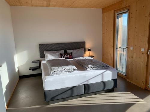 Giường trong phòng chung tại Ferienwohnungen Adelnhoven