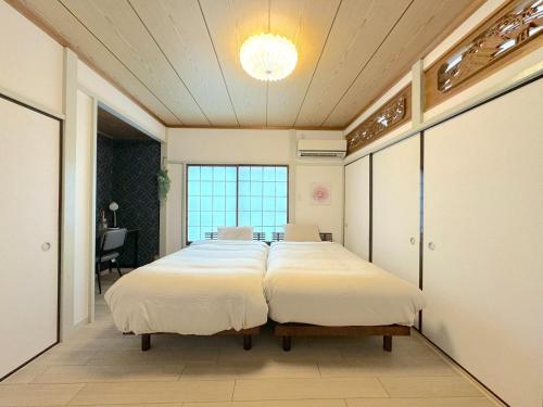 Postel nebo postele na pokoji v ubytování Ashigarashimogun - House - Vacation STAY 17328