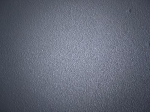 a white wall with a lot of specks on it at hidden valley new basement suite with private bathroom! in Calgary