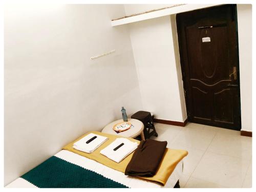 Een bed of bedden in een kamer bij Le Casa Stay