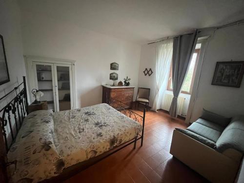 Een bed of bedden in een kamer bij La Vertecena