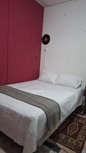 Postel nebo postele na pokoji v ubytování La Lomita