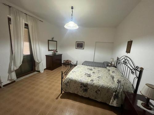 Een bed of bedden in een kamer bij La Vertecena