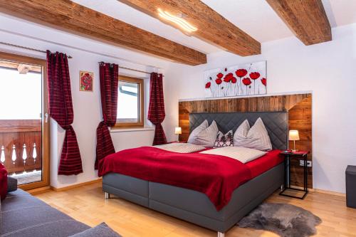 En eller flere senge i et værelse på Der Bichlhof - Zell am See