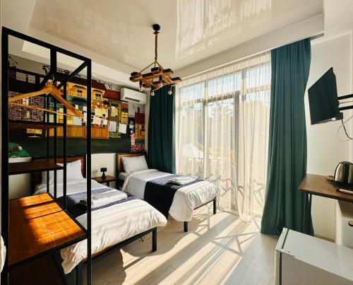 Hotel Boutique George 객실 침대