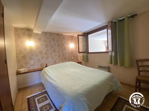 Giường trong phòng chung tại Ribelles