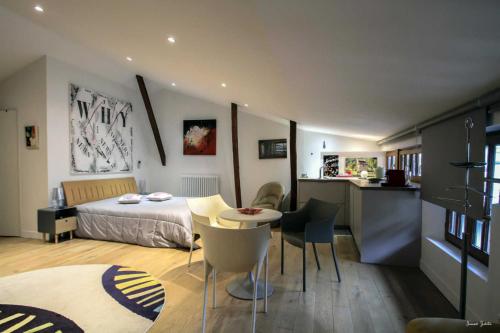 Giường trong phòng chung tại Loft 17