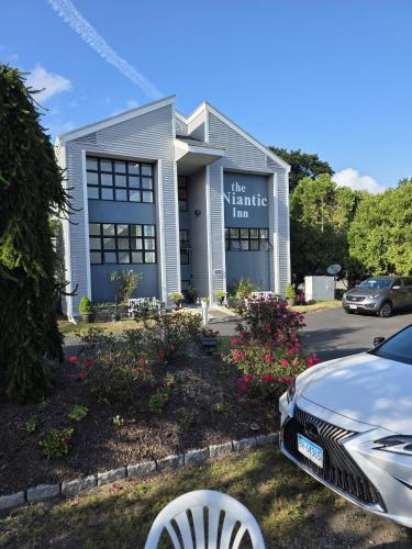 a car parked in front of the temple inn at The Niantic Inn in Niantic