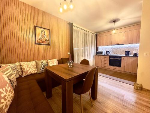 Kuchyň nebo kuchyňský kout v ubytování Petkovi Аpartments, Borovets Gardens - One-bedroom and Two-bedroom apartments