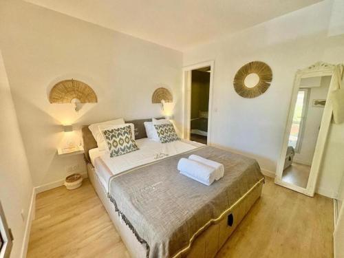 Voodi või voodid majutusasutuse Arcachon Private Suite toas