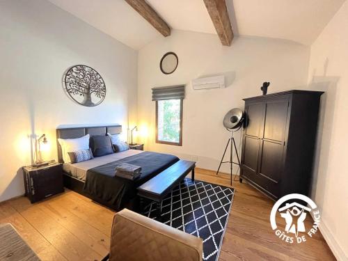 En eller flere senge i et værelse på L'hacienda