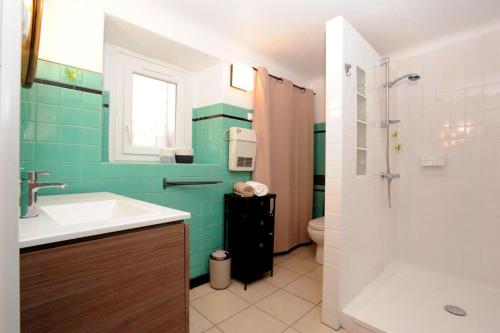 Phòng tắm tại La maison de nini