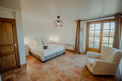 Postel nebo postele na pokoji v ubytování Chez Philippe Parenthèse en campagne