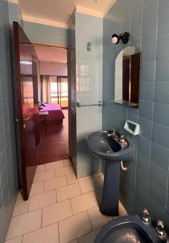 a bathroom with a sink and a toilet at Miramar 19 in Miramar