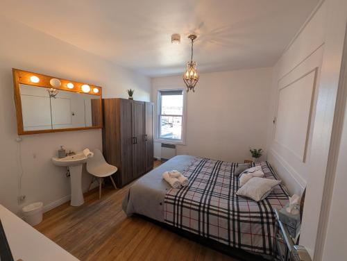 Et badeværelse på Le Namasté Auberge touristique