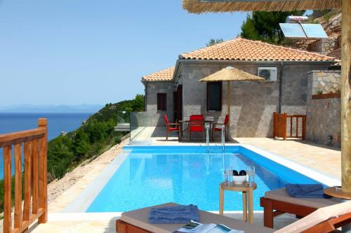 The swimming pool at or near Milos Paradise Luxury Villas