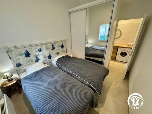 En eller flere senge i et værelse på La maisonnette