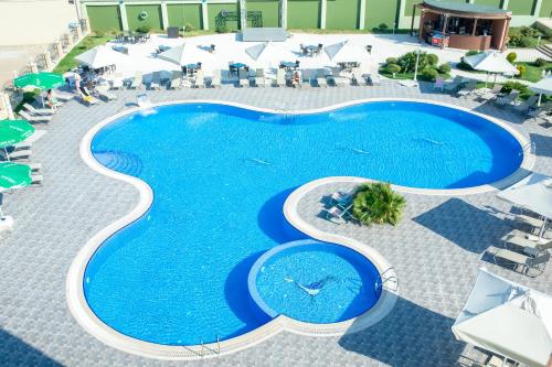 an overhead view of a swimming pool at a resort at Khazar Inji Hotel in Baku