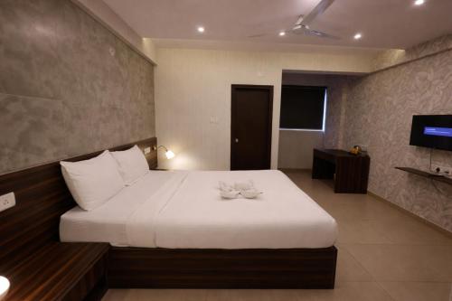 En eller flere senge i et værelse på Oris Brookefield