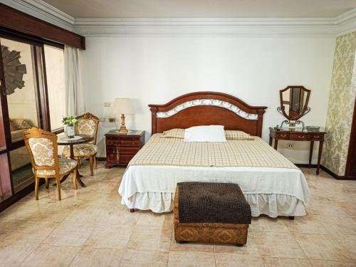 Postel nebo postele na pokoji v ubytování Ex Hotel Asturias Centrico