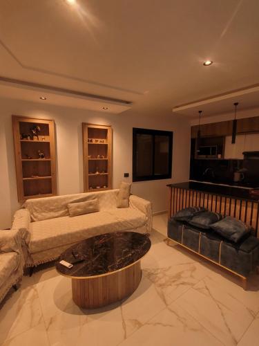 Ein Sitzbereich in der Unterkunft Immobilier hammamet nord