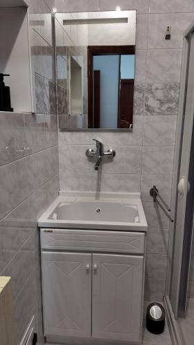 a bathroom with a sink and a mirror at Rosita Rooms in Lecce