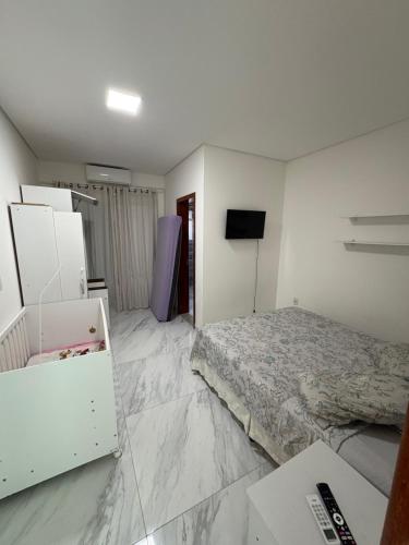 Et tv og/eller underholdning på The Brown beach House