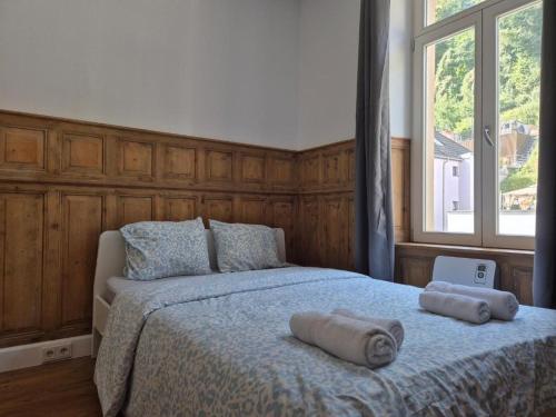 En eller flere senge i et værelse på Studio with External Bathroom Near to the City Centre