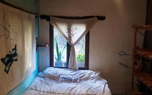 Giường trong phòng chung tại El hostelcito