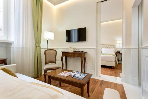 Letto o letti in una camera di Hotel Degli Artisti