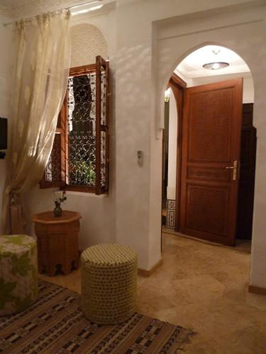 Una televisión o centro de entretenimiento en Riad Viva