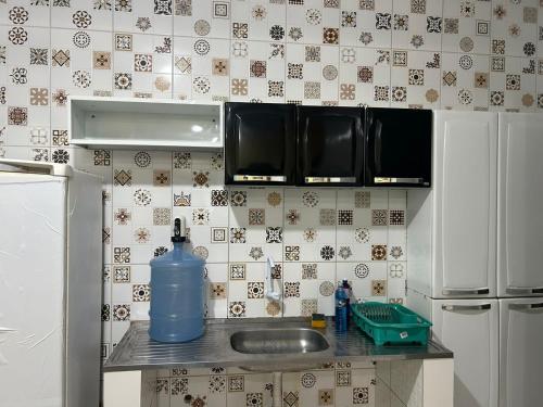 Küche/Küchenzeile in der Unterkunft casa em peroba